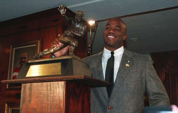 Rashaan Salaam accepting the Heisman Trophy in 1994. Rashaan was a 1st Round Pick for the Chicago Bears in the 1995 NFL draft. 