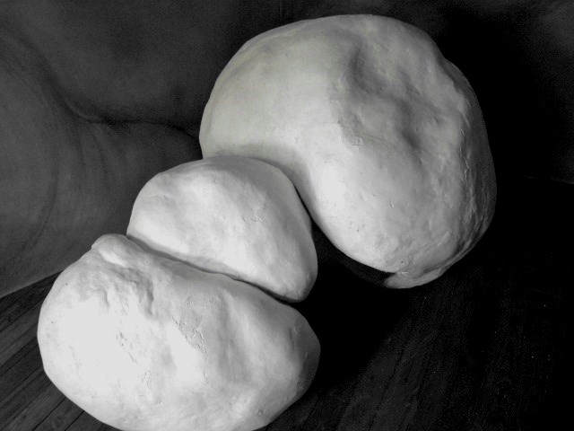 Two forms: a morphing sculpture , Plaster, 37 X 41 X 28 inches and 24 X 17 X 22 inches, 2014.