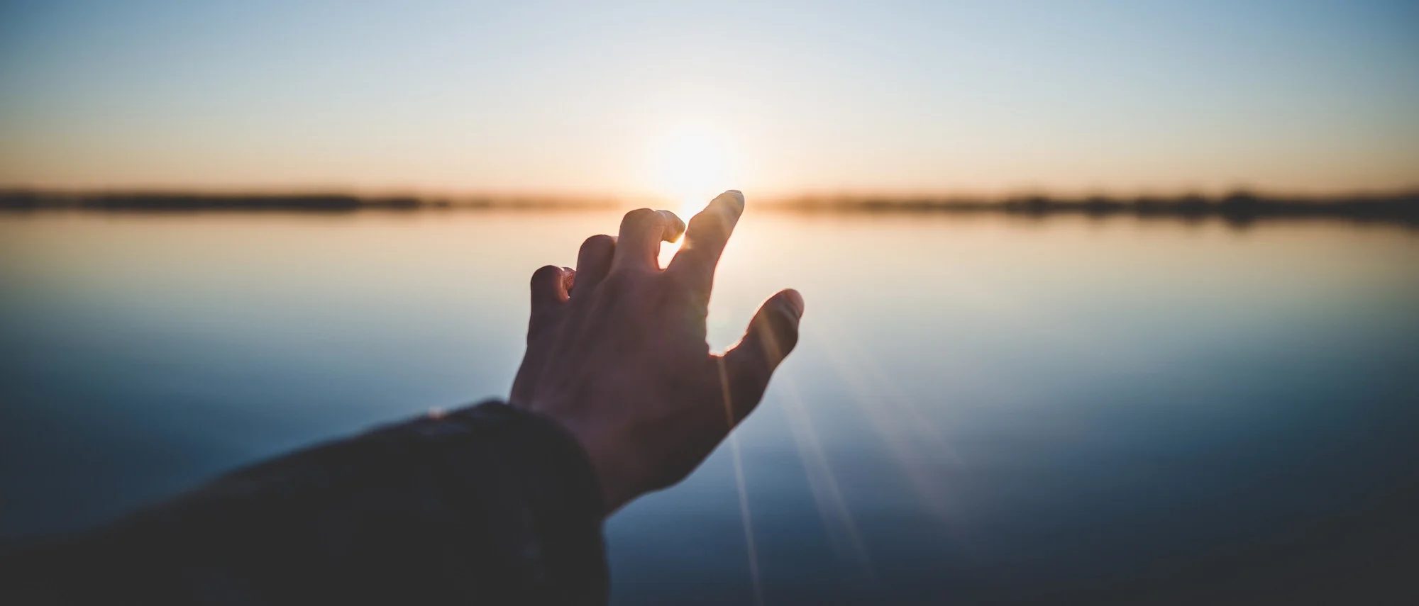 Hand+Reaching+to+the+Rising+Sun.jpg
