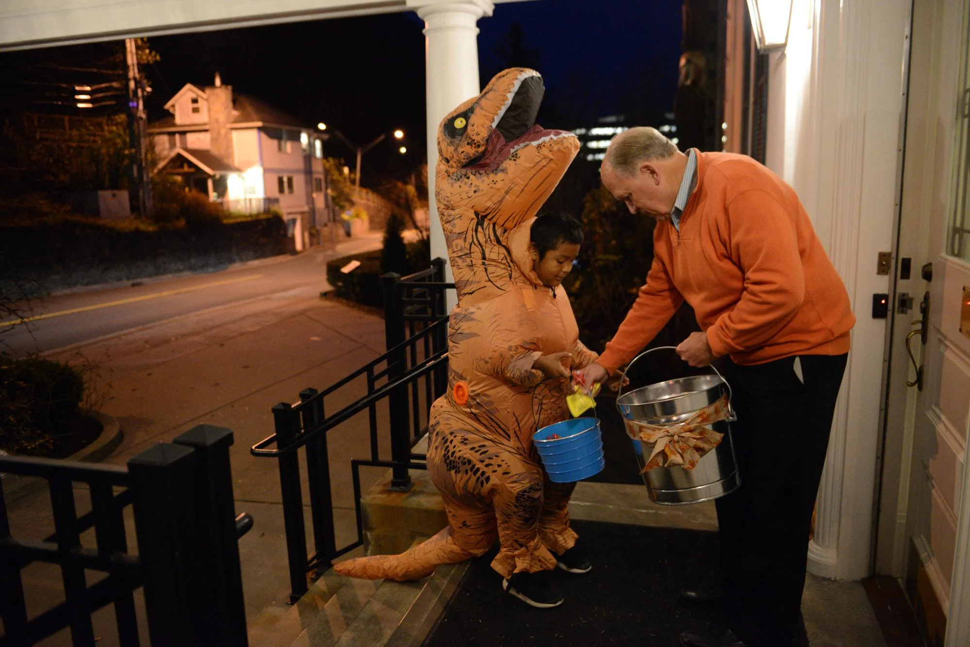 Governor Bill Walker greets an Alaskan tyrannosaurus at the Governor’s mansion in Juneau. October 31, 2018.