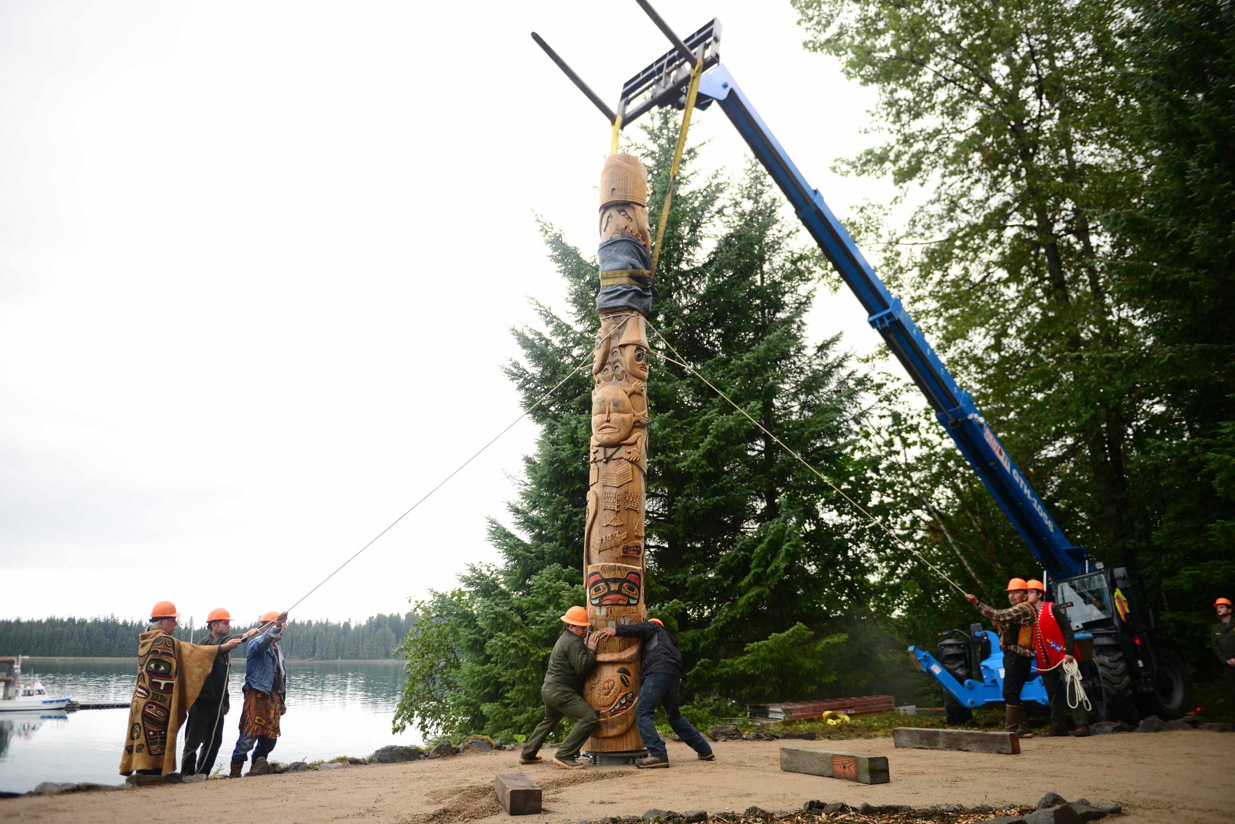  A healing pole is erected in Bartlett Cove in Glacier Bay National Park, representing a new chapter in the relationship between the National Park Service and the Tlingit people, who worked collaboratively to build a new clan house in the Cove, prior