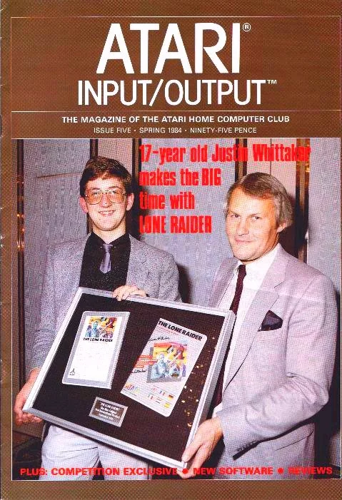 Justin getting his packaged game from the Atari UK MD Graham Clark