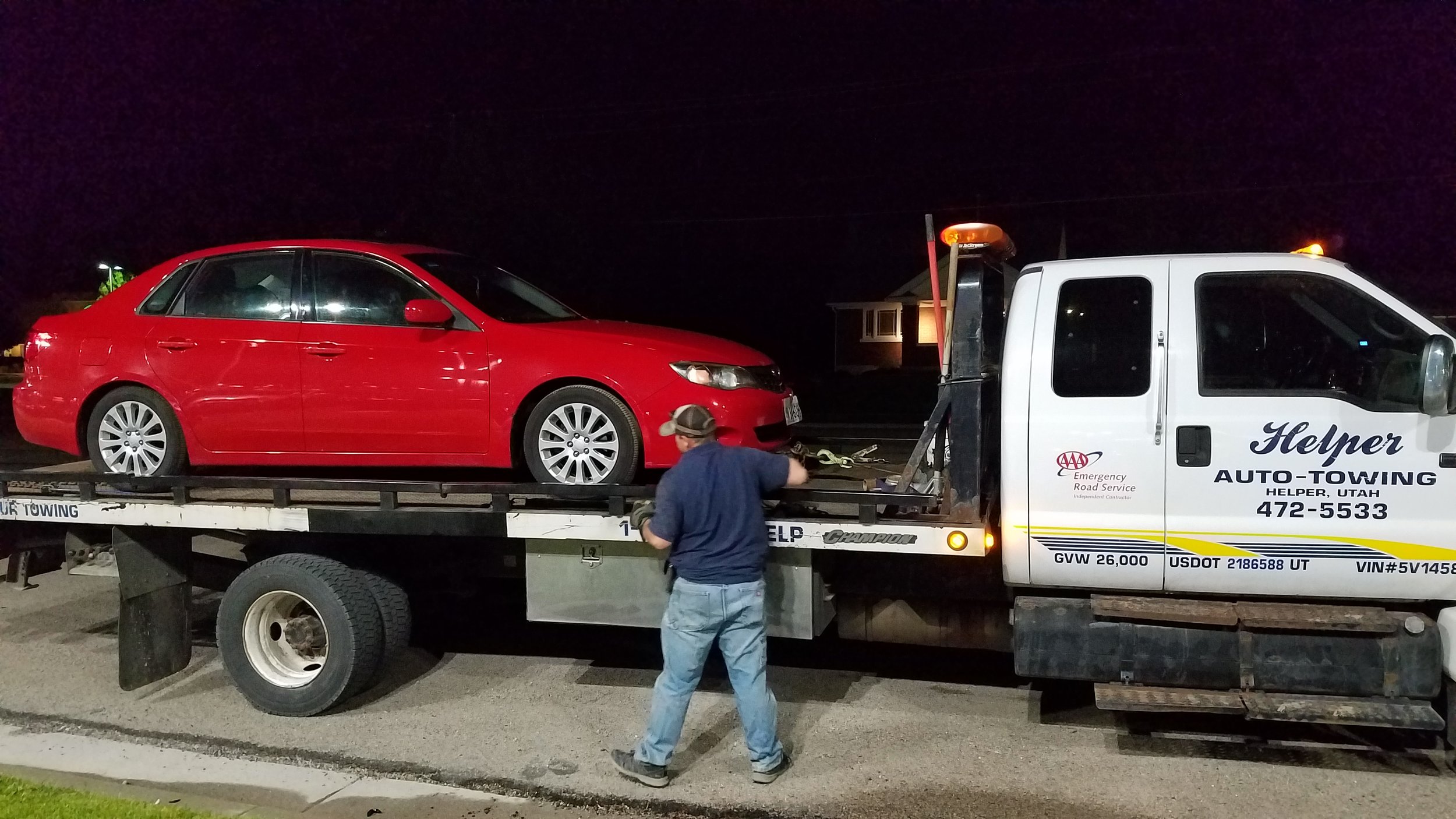 About midnight we meet them outside the Subaru garage, where we leave the car. $5,000 later and essentially a new engine, it's working again!