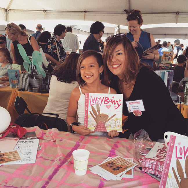 Kristine poses with a cute fan