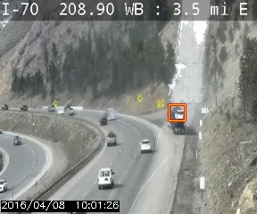 A stopped vehicle is detected at the base of a runaway truck ramp.