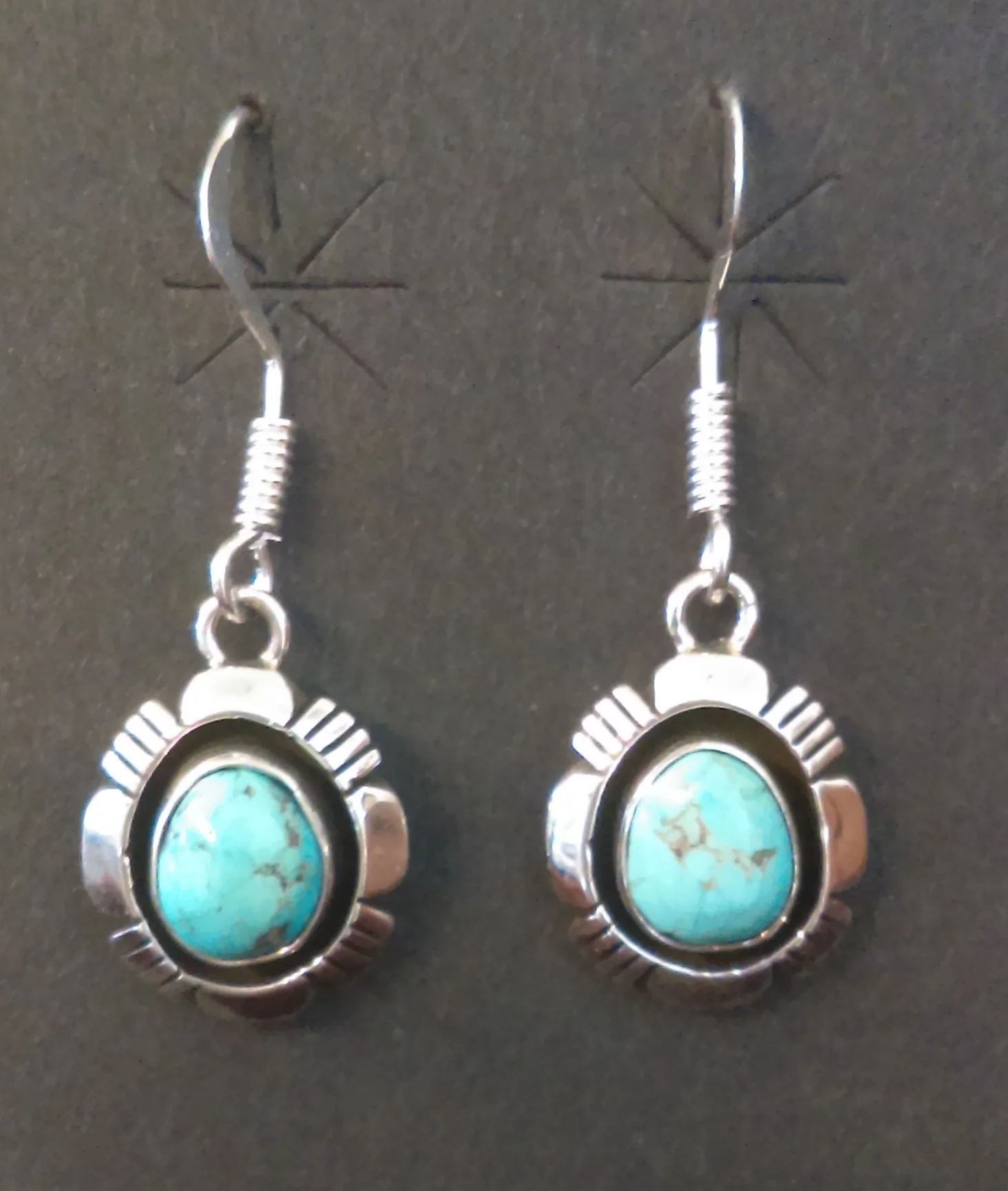 A.G. c.t. earring.jpg