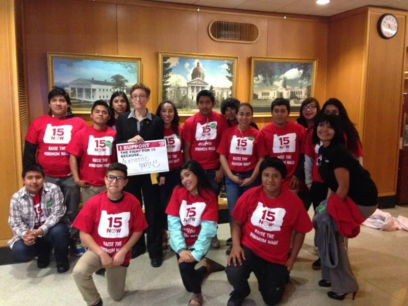 Speaker Tina Kotek and community members from PCUN.