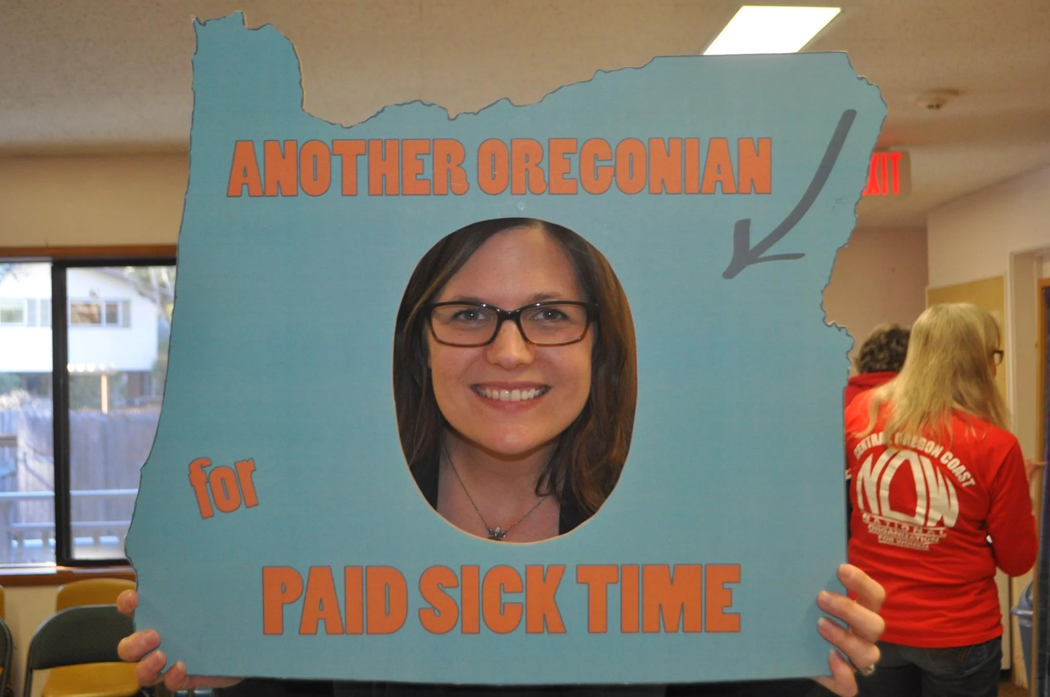 Executive Director Michelle Ganow-Jones supporting paid sick days at an Oregon NOW annual meeting. 
