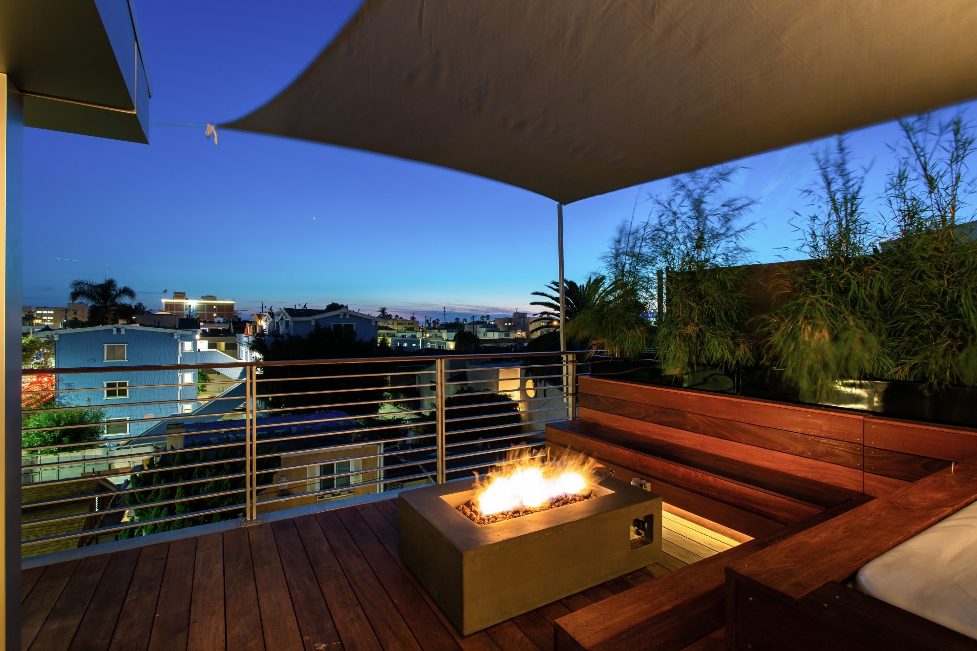 Alberta Beach Lofts A panoramic rooftop w/integrated BBQ & prep sink, along w/built-in seating, natural gas fire-pit and 4-person spa completes this amazing home.