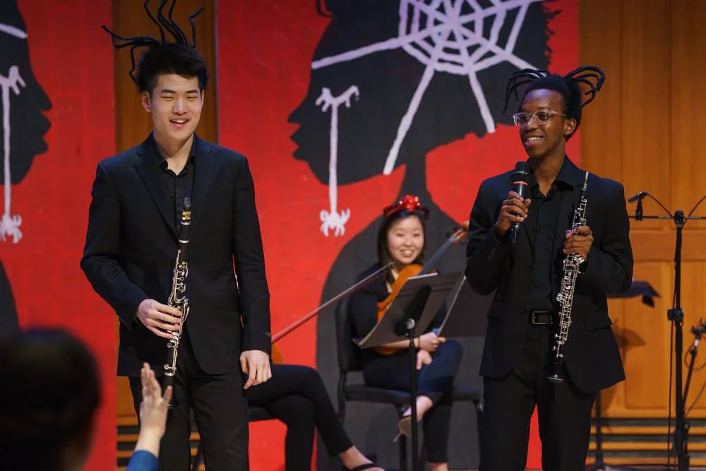Clarinettist Yan Liu and oboist Mekkhi Gladden play a musical game with the audience.
