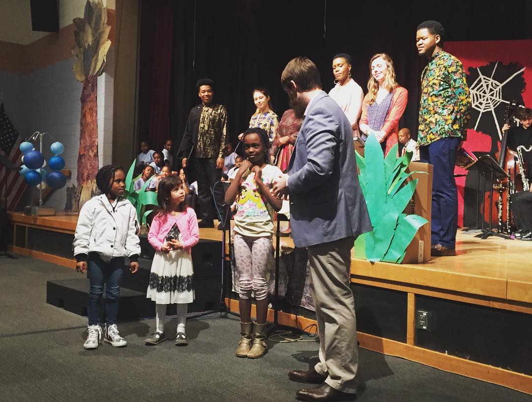  The creative team with audience members at Girard College during the Anansi pre-show. 