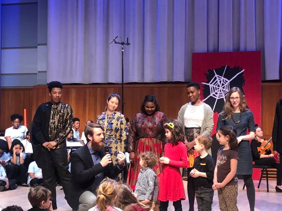  Nick leads a group composition exercise with audience members alongside the cast and creative team. 