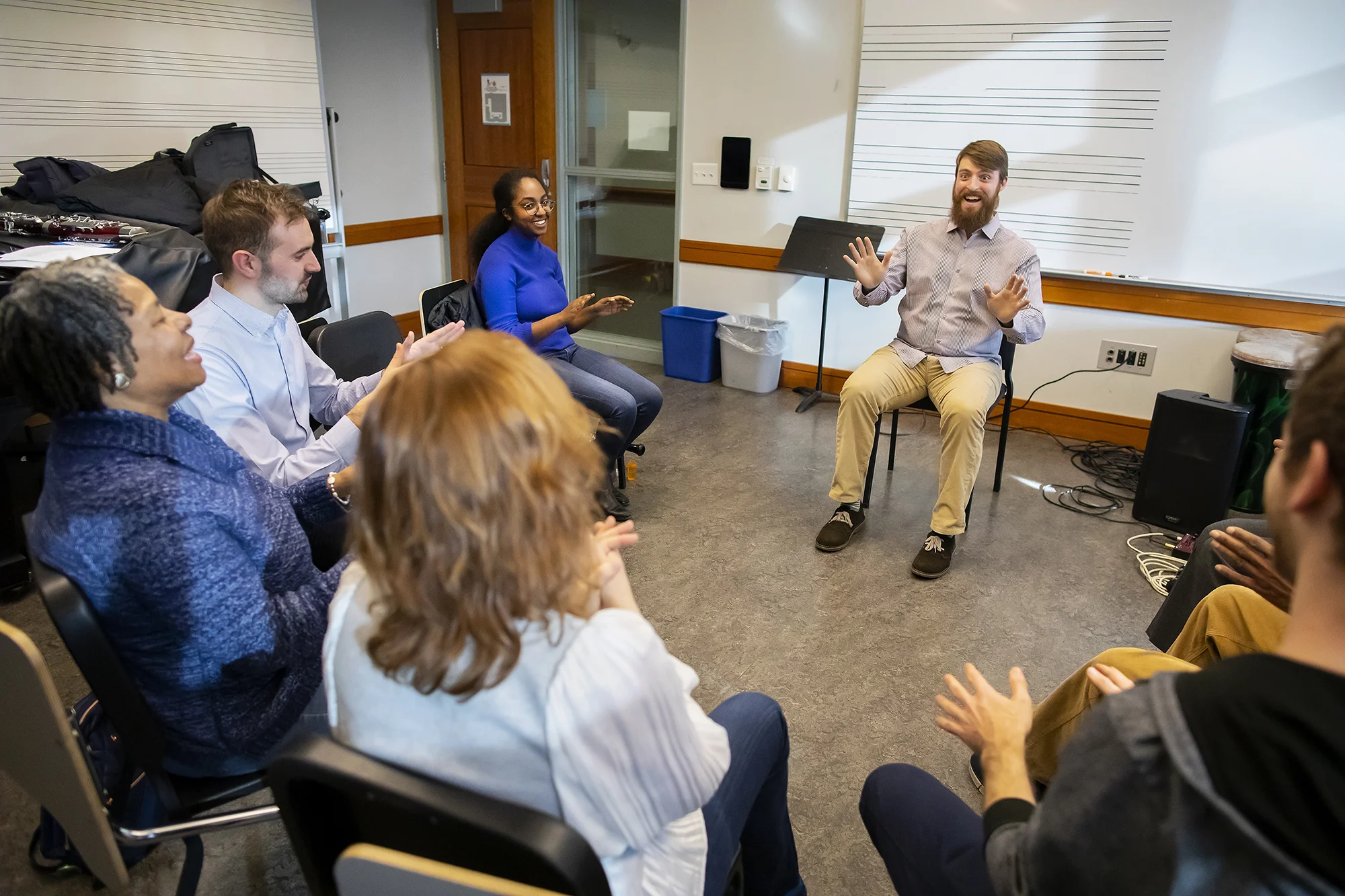 Nick leads a body percussion exercise during a Creative Expression Through Music session. Photo by Eric Sucar/Penn University Communications.