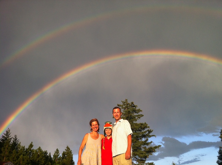 Jnana and her family under a Double Rainbow in Mt. Shasta