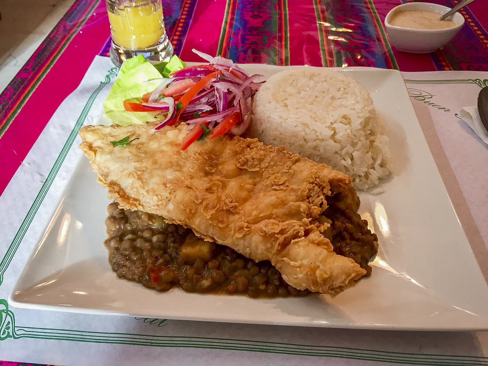Course 2: Fried fish with lentils and rice
