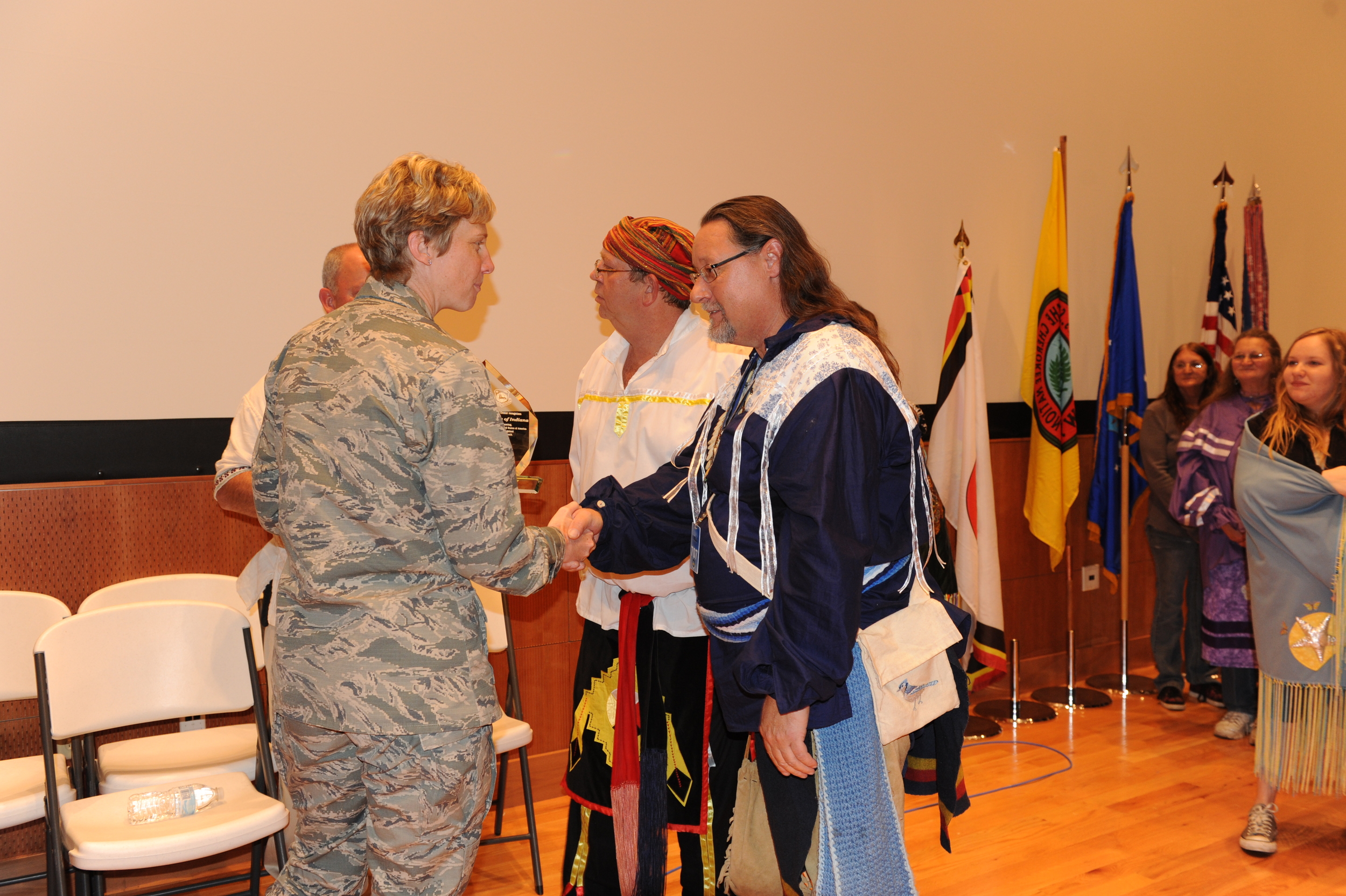 The Indiana Miami receiving a Recognition award from the Base Commander.