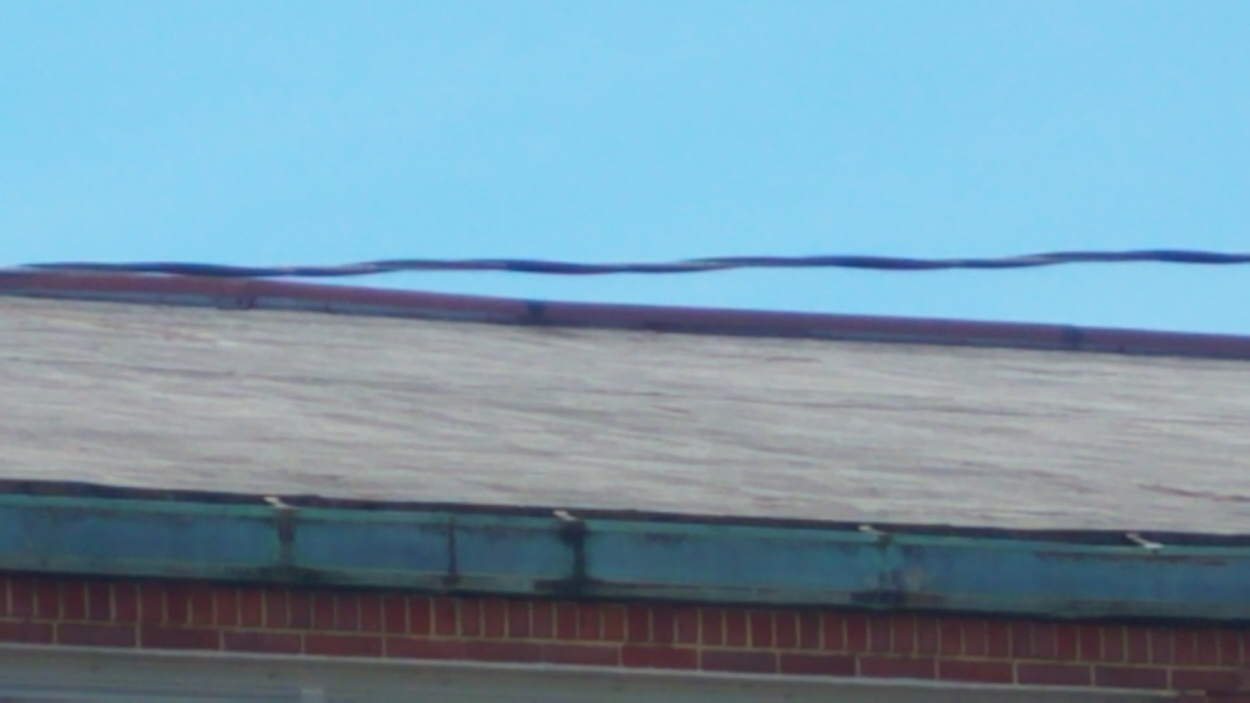 Old Gym Roof and Gutters.jpg