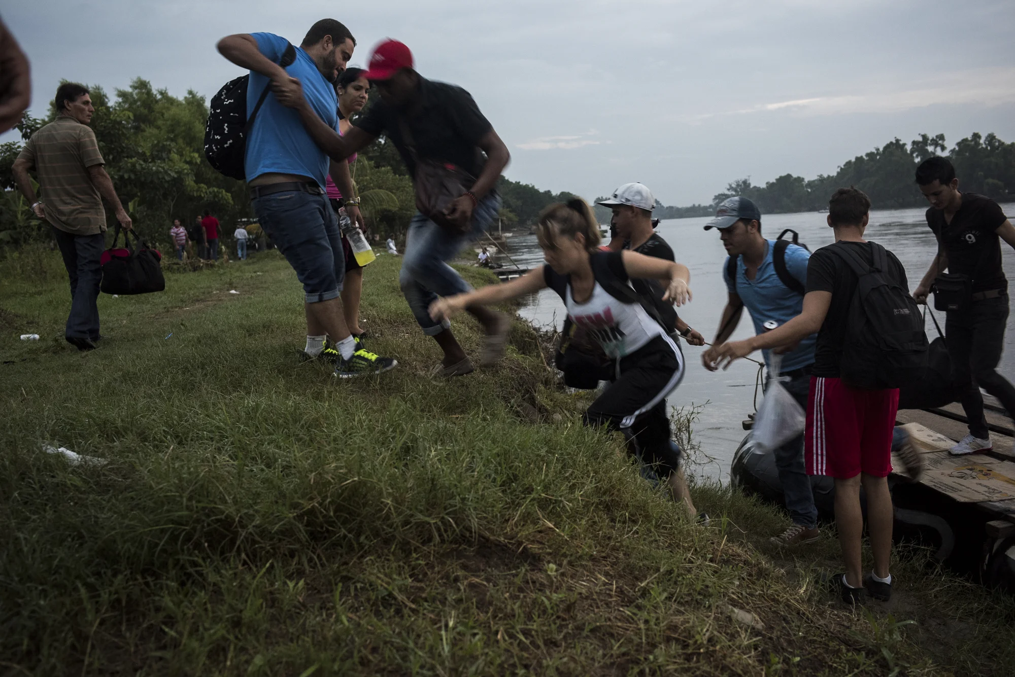  Cuban refugees come ashore on the Mexican side of the Suchiate River after crossing from Guatemala. While this is the last country they have to traverse before reaching the United States, it's also considered the most dangerous for them as they navi