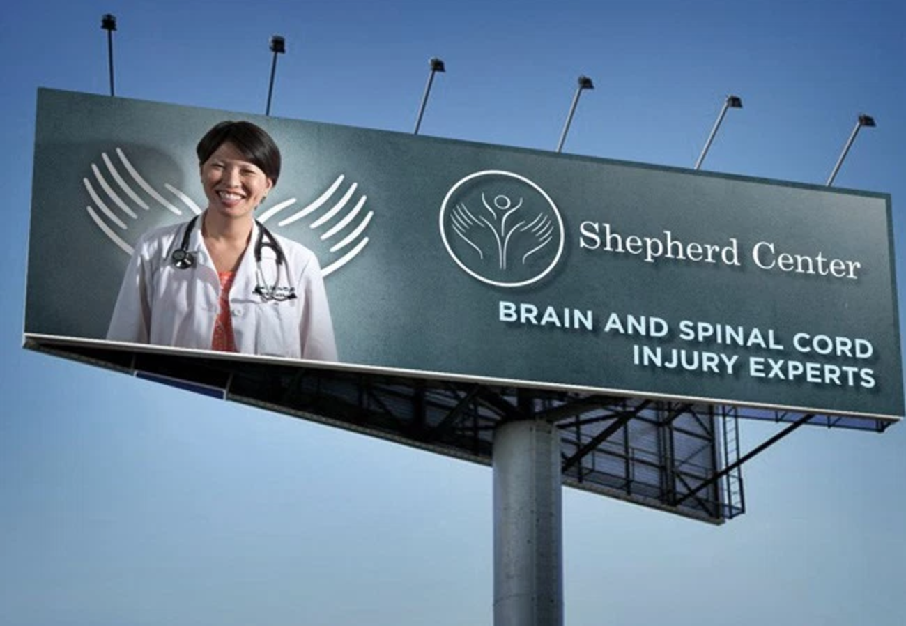 Out of Home billboard for Shepherd Center. Doctor with wings. Brain and Spinal Injury Experts.