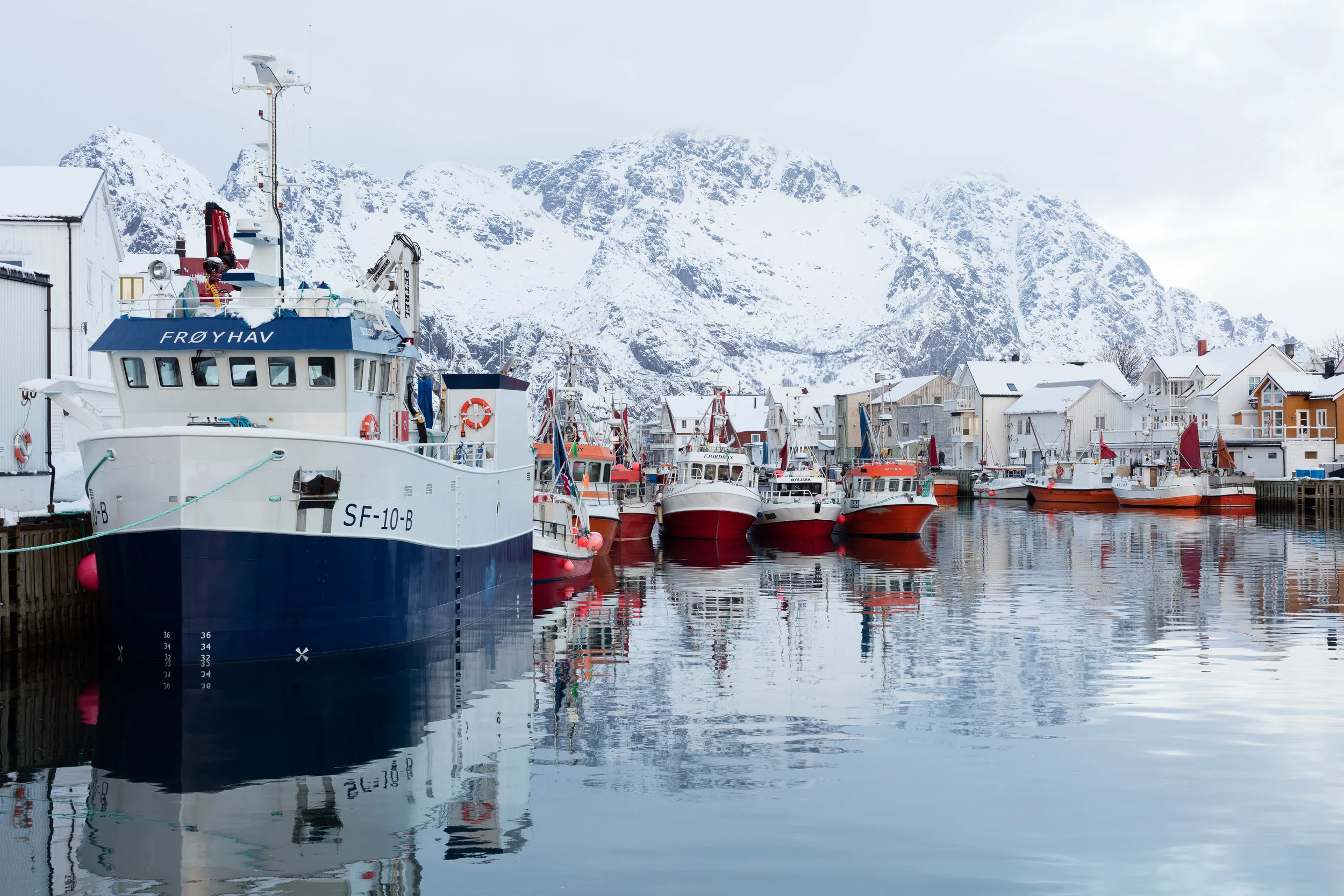 Henningsvær, Lofoten. Local fishing boats in the afternoon, ready for getting out early the next day.
