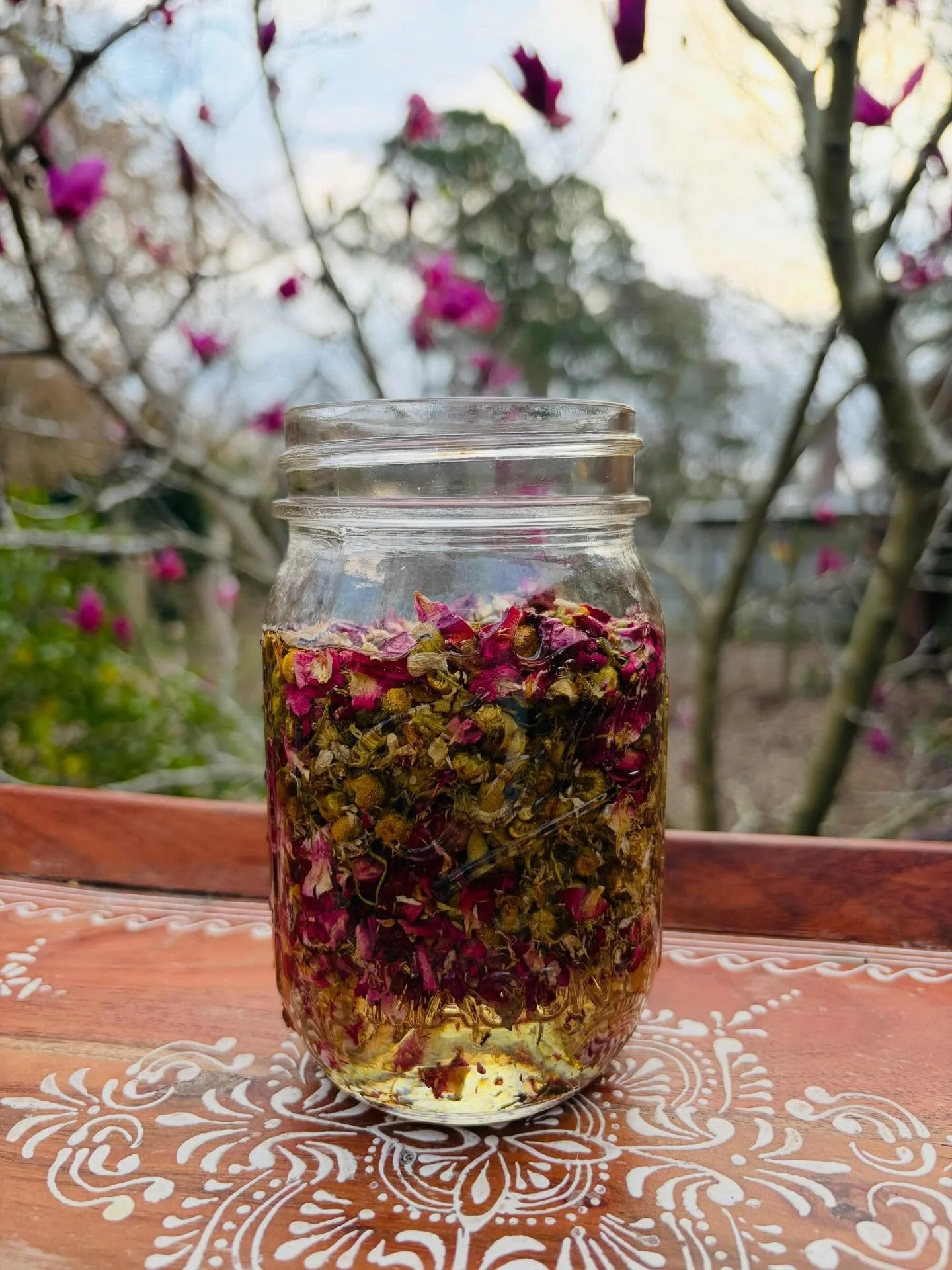 Our lovingly handcrafted Gentle Under Eye Serum starts like this. It is formulated with slow-infused sweet almond oil, rose petals, and chamomile flowers to gently support the reduction of under eye puffiness and fine lines. Lightweight and nourishin