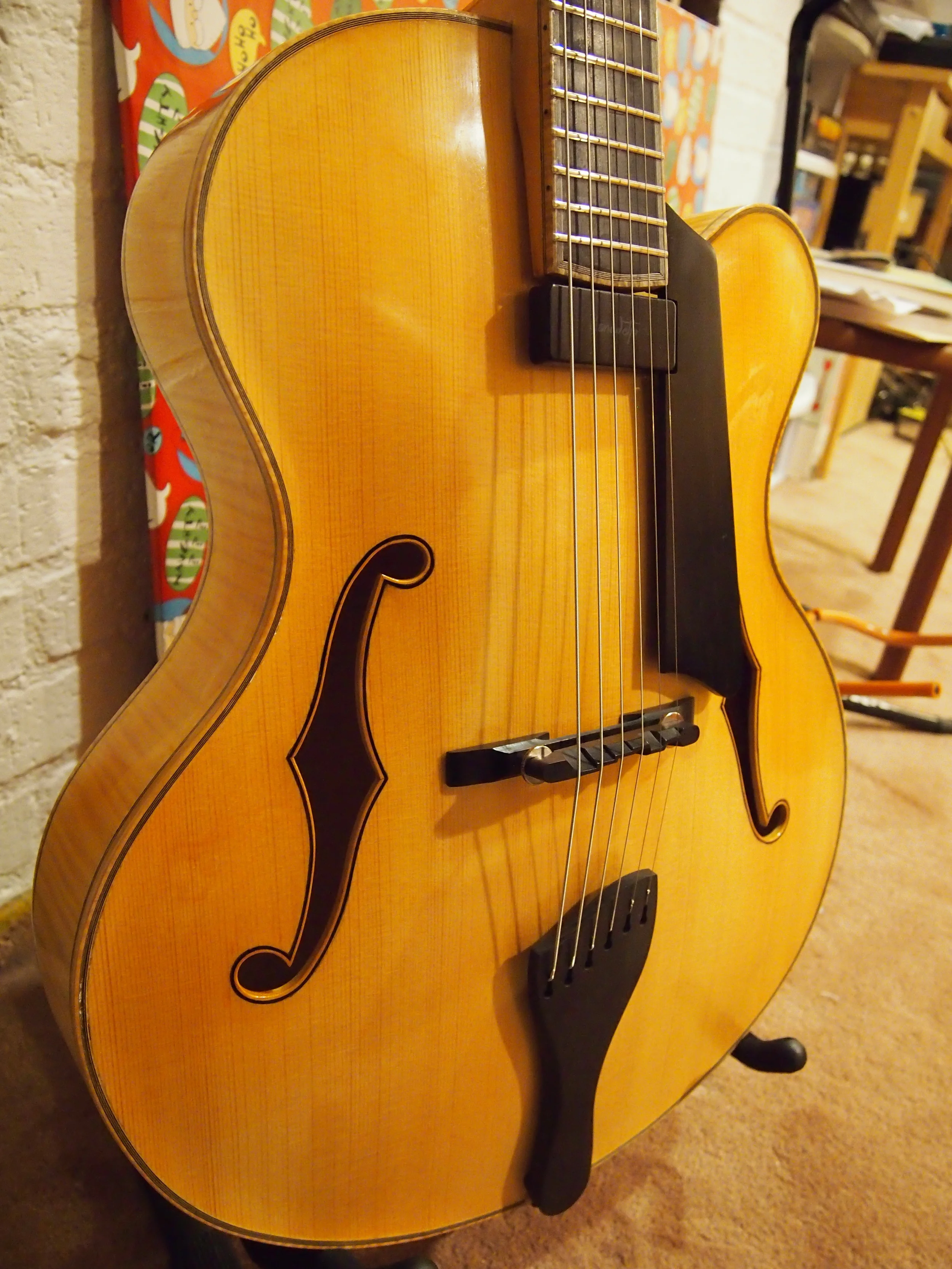 Close up of f-holes and spruce top