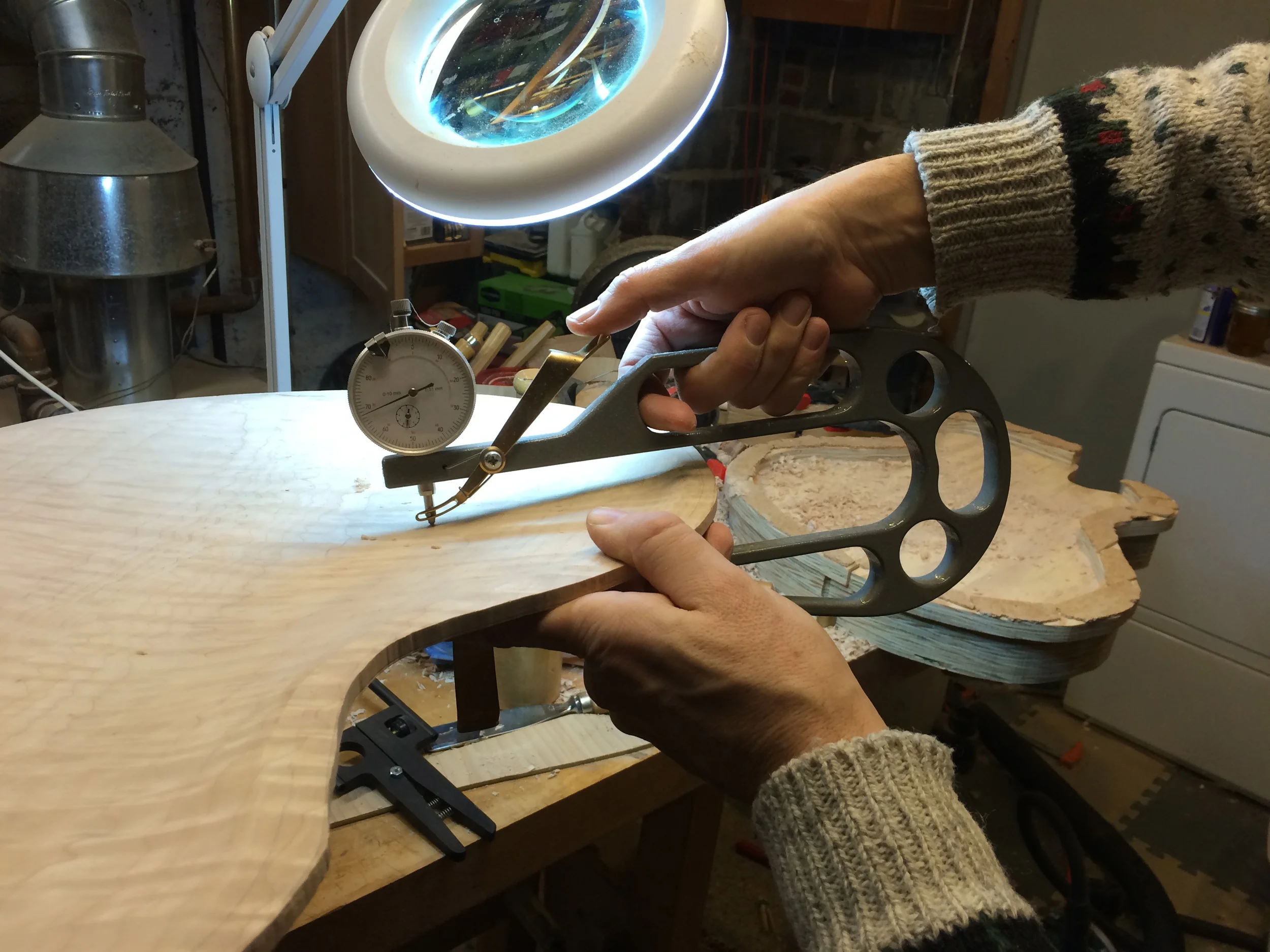 Checking the thickness with a caliper.