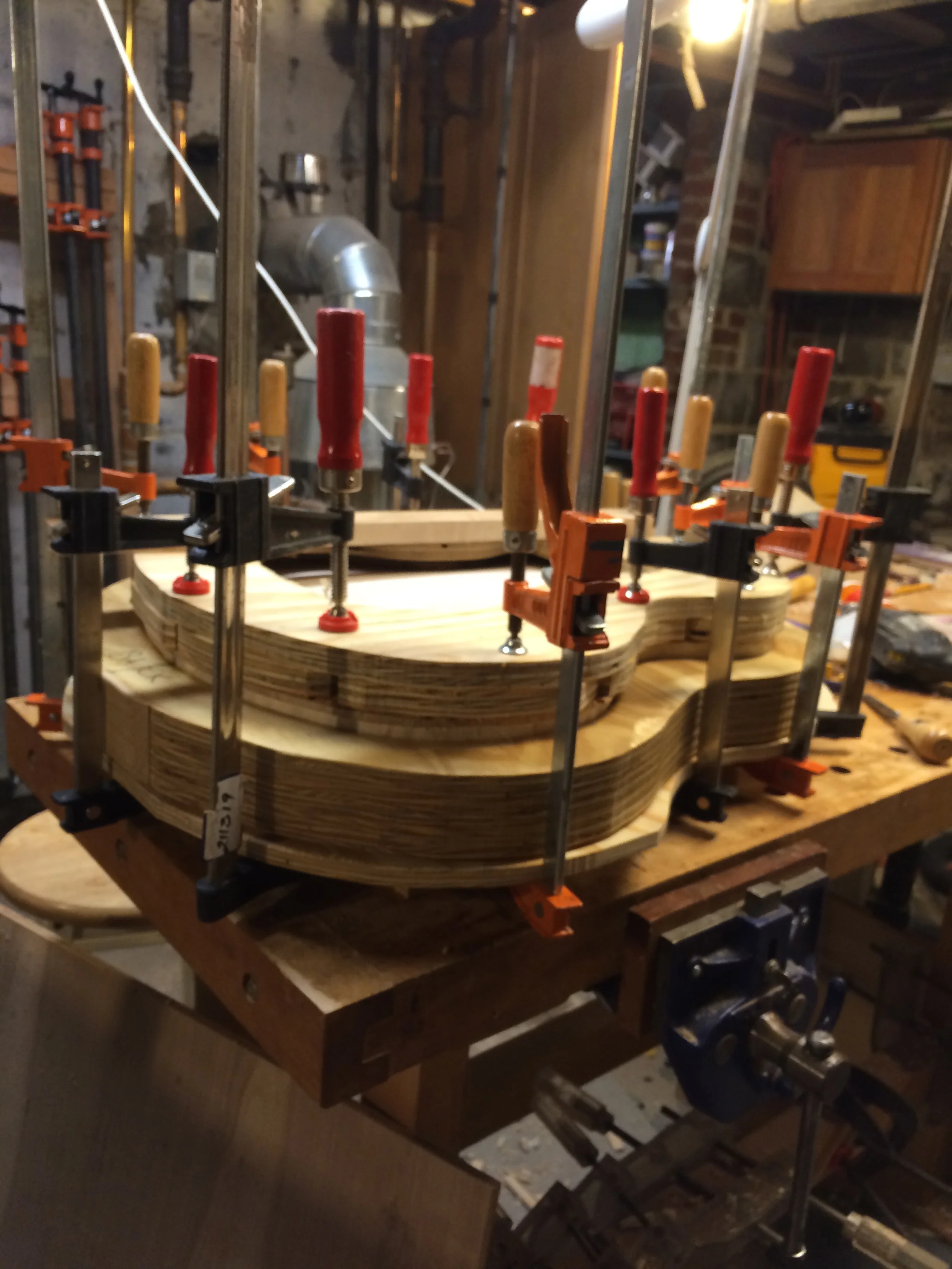 This is actually the back being glued on using a caul and table.