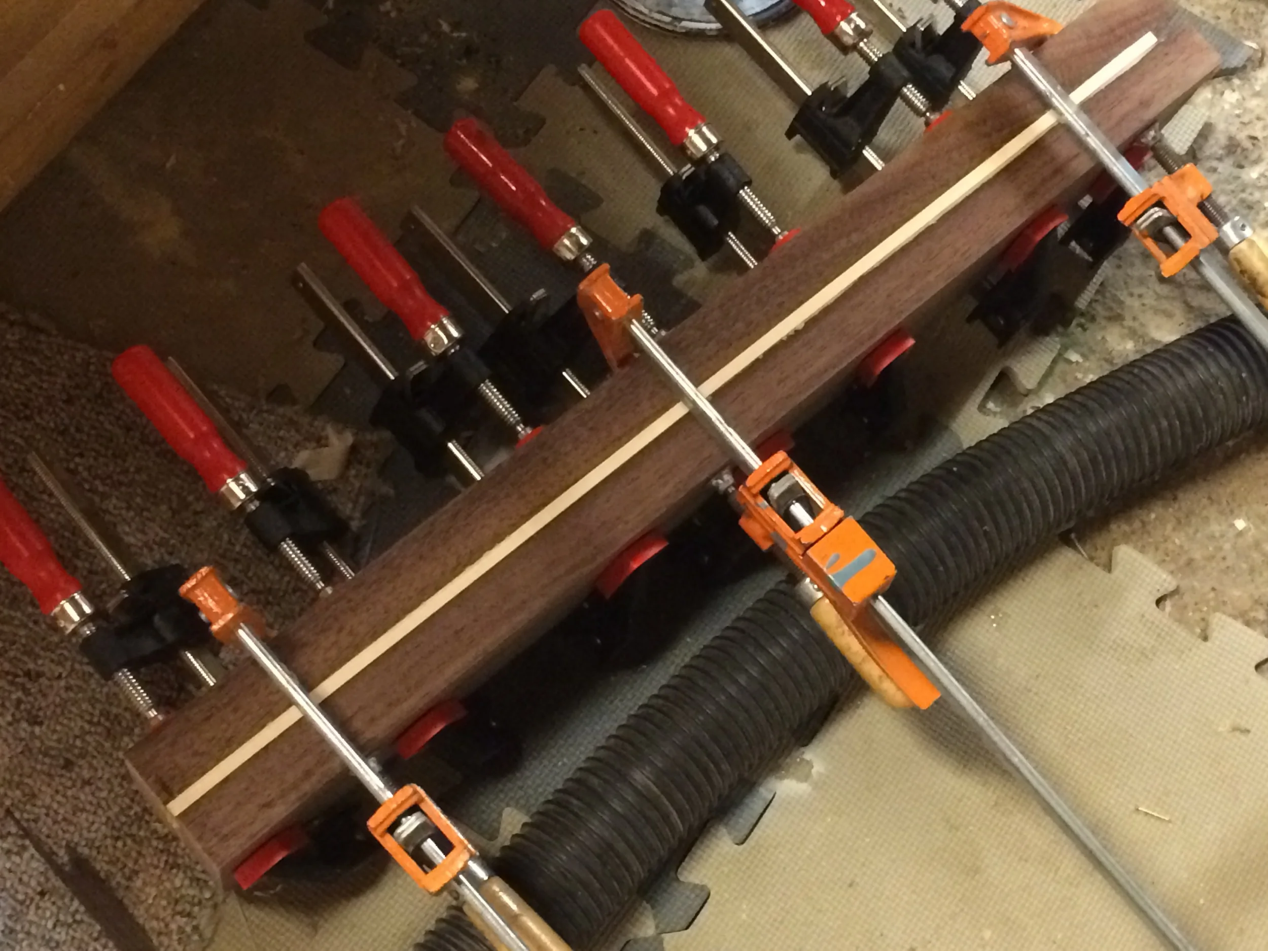 Here is a neck blank glue up. Maple and walnut.