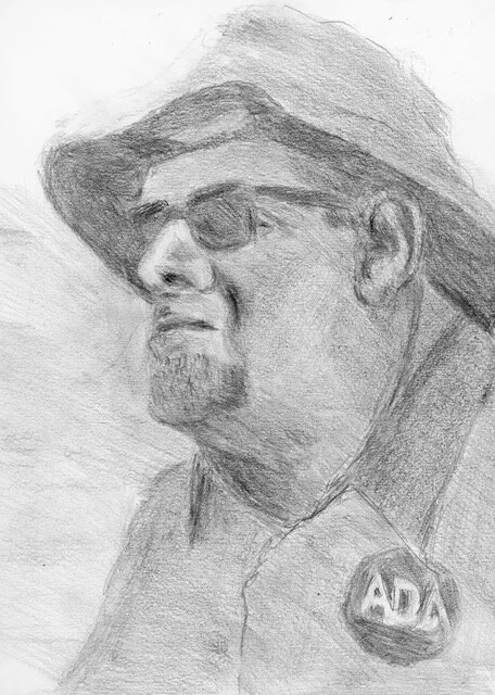 A drawing done by Chris Palames of me at the 20th anniversary of the ADA celebration in Boston