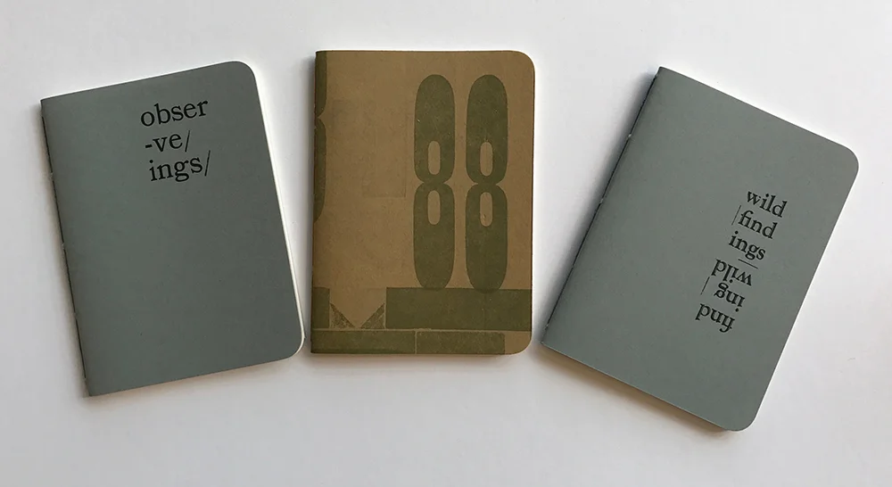 Pamphlet-bound notebooks with covers letterpress-printed from wood type.