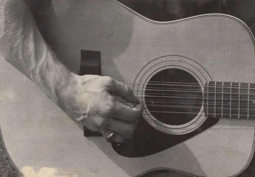 Playing my old Yamaha 12 string for a high school photography project.