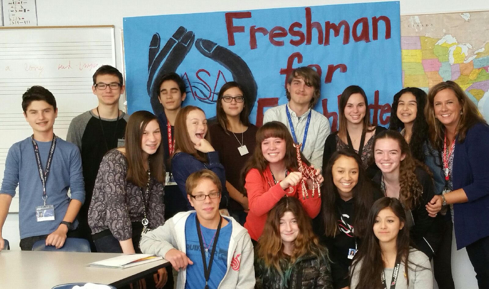 Students from Arizona School of the Arts holding their prize from October's mini-drawing