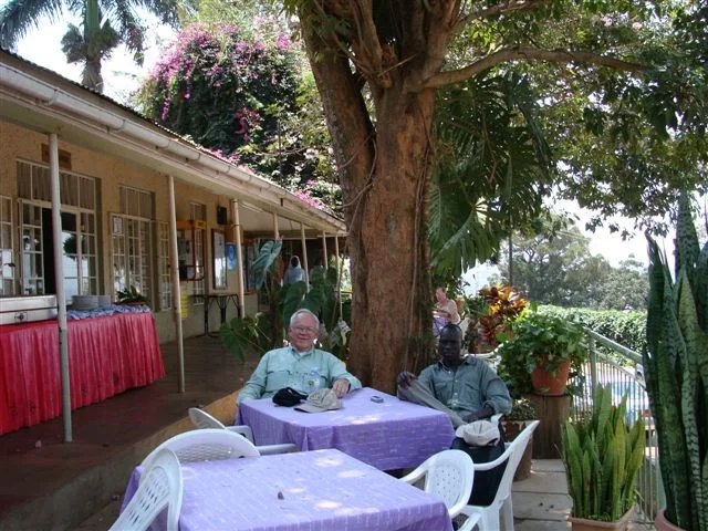 Salva and John Turner, WFSS’s first volunteer Chief Operations Officer, in Kampala c. 2009.