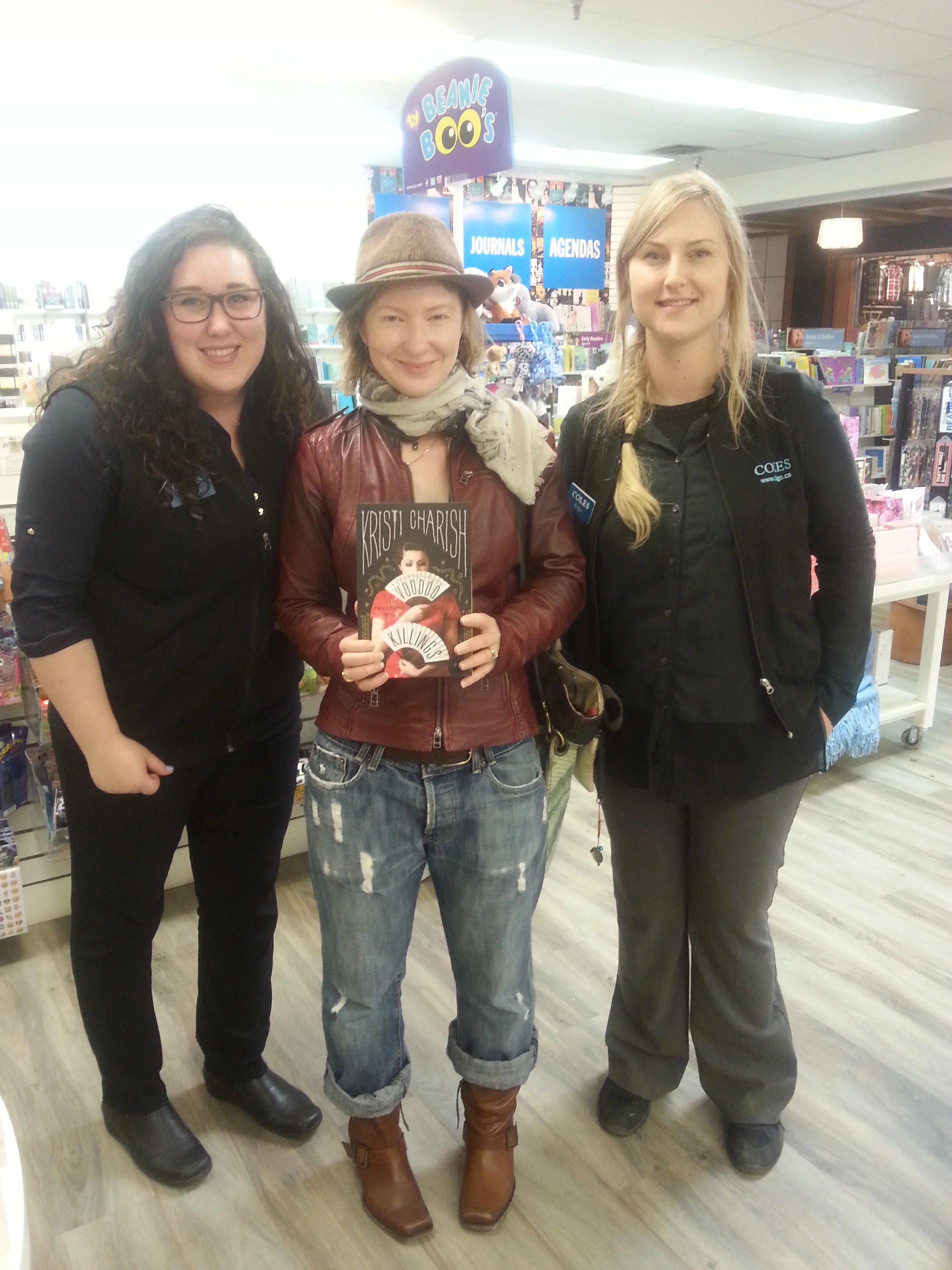 Coles Bookstore in Nelson BC - I'm showing off The Voodoo Killings and some of my thrift store finds (hat and scarf). We hit second hand/thrift stores in every city we visited. (photo by Alex Renwick).
