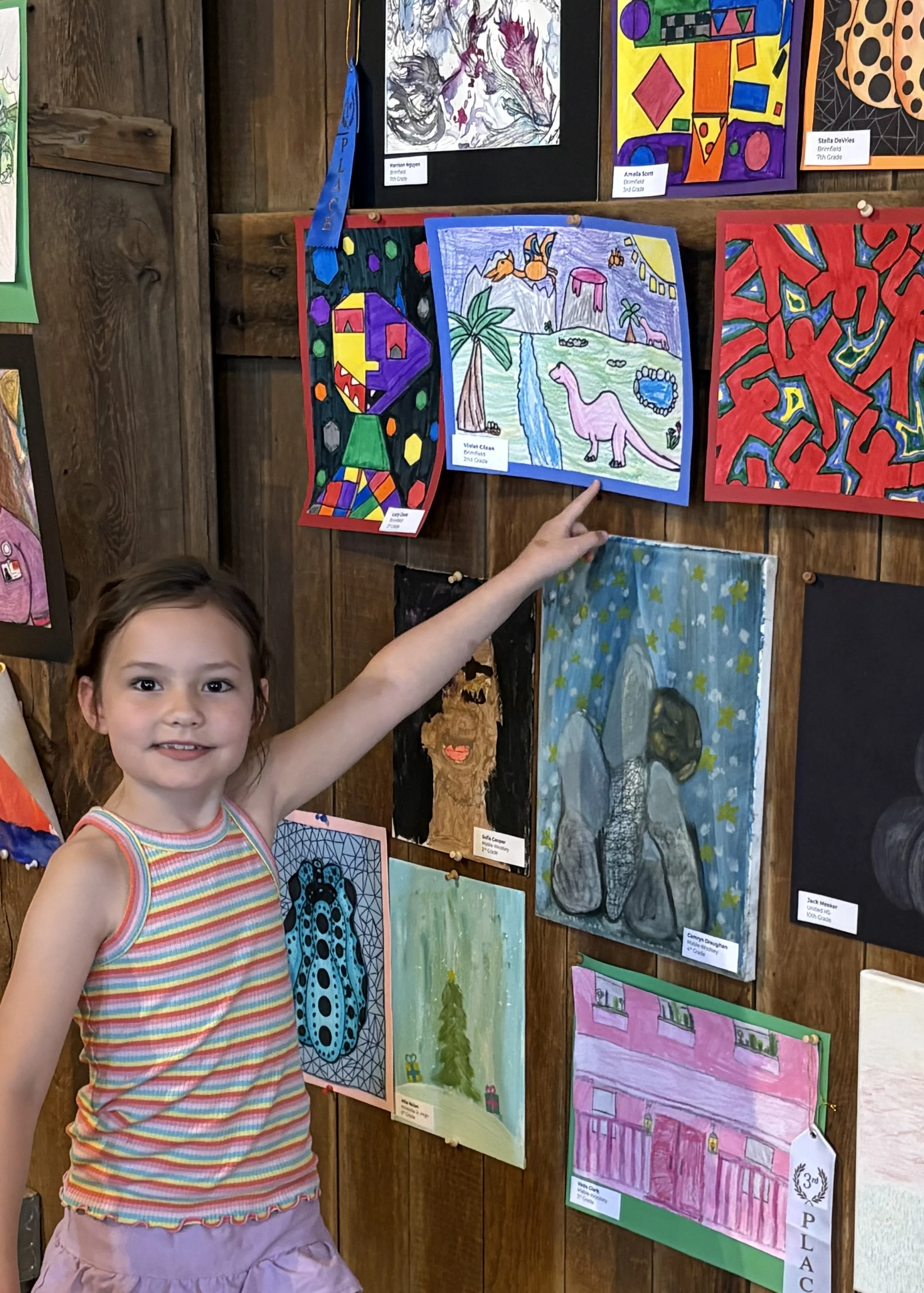 Kids Rock Participant with her 2025 entry.jpeg
