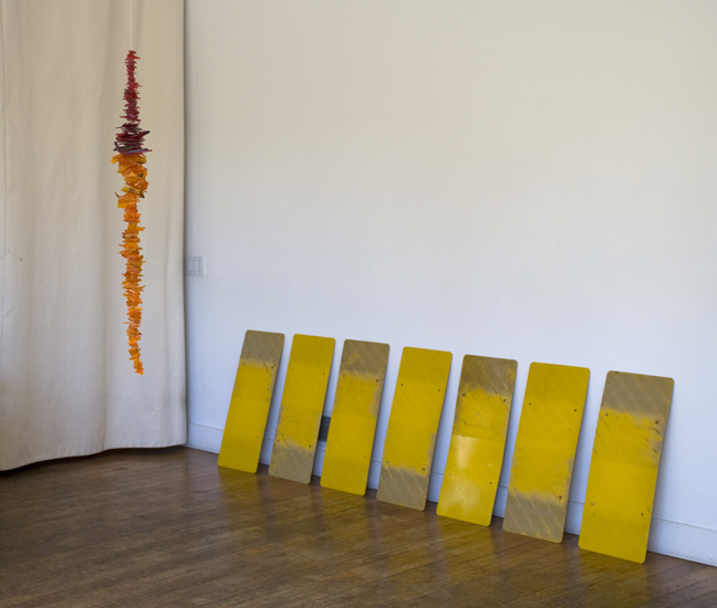 Installation View, Tall Trees , 2010 foreground: Vein , 2010, automobile tail light pieces, monofiliment, 30" tall on wall: Outlook , 2010, waxed and oxidized metal, paint, 7 units, 30" x 102" x 6"