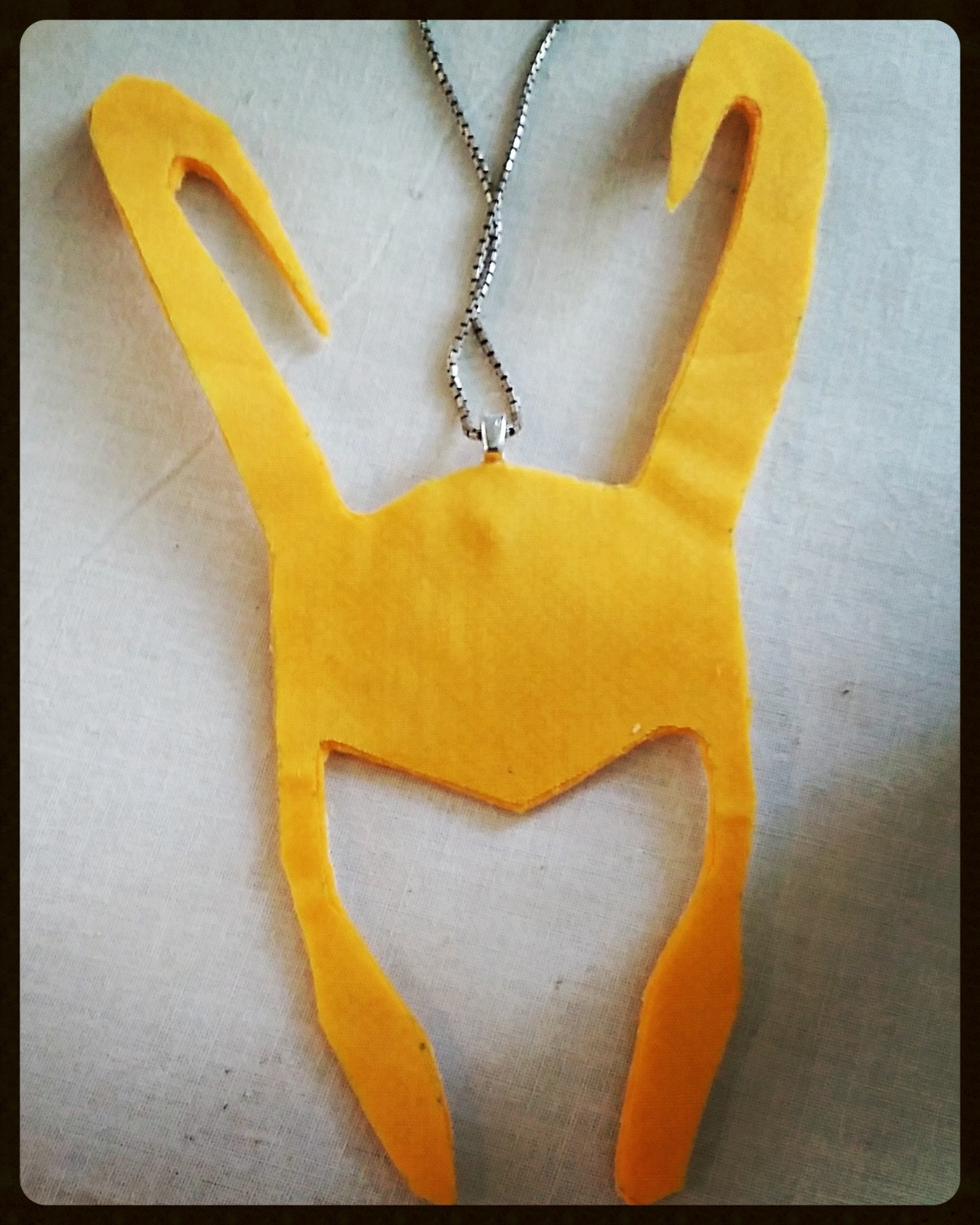But I could walk around embracing my inner "baddie" with this little charm.