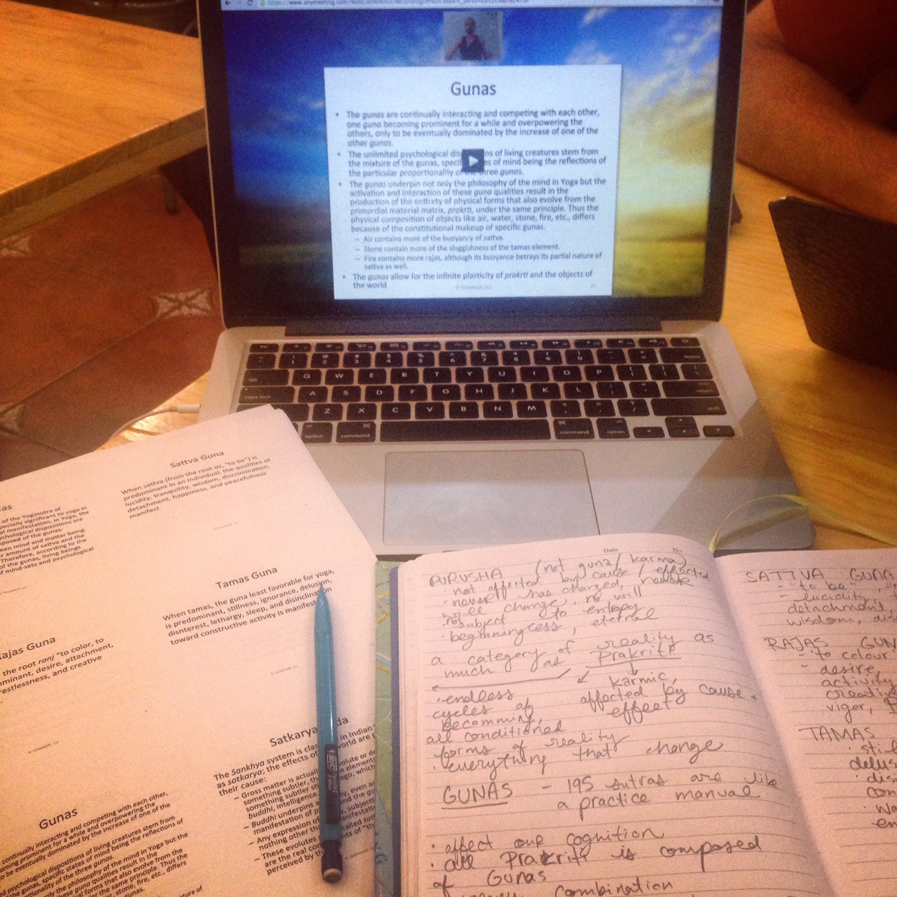 Watching lectures and taking notes