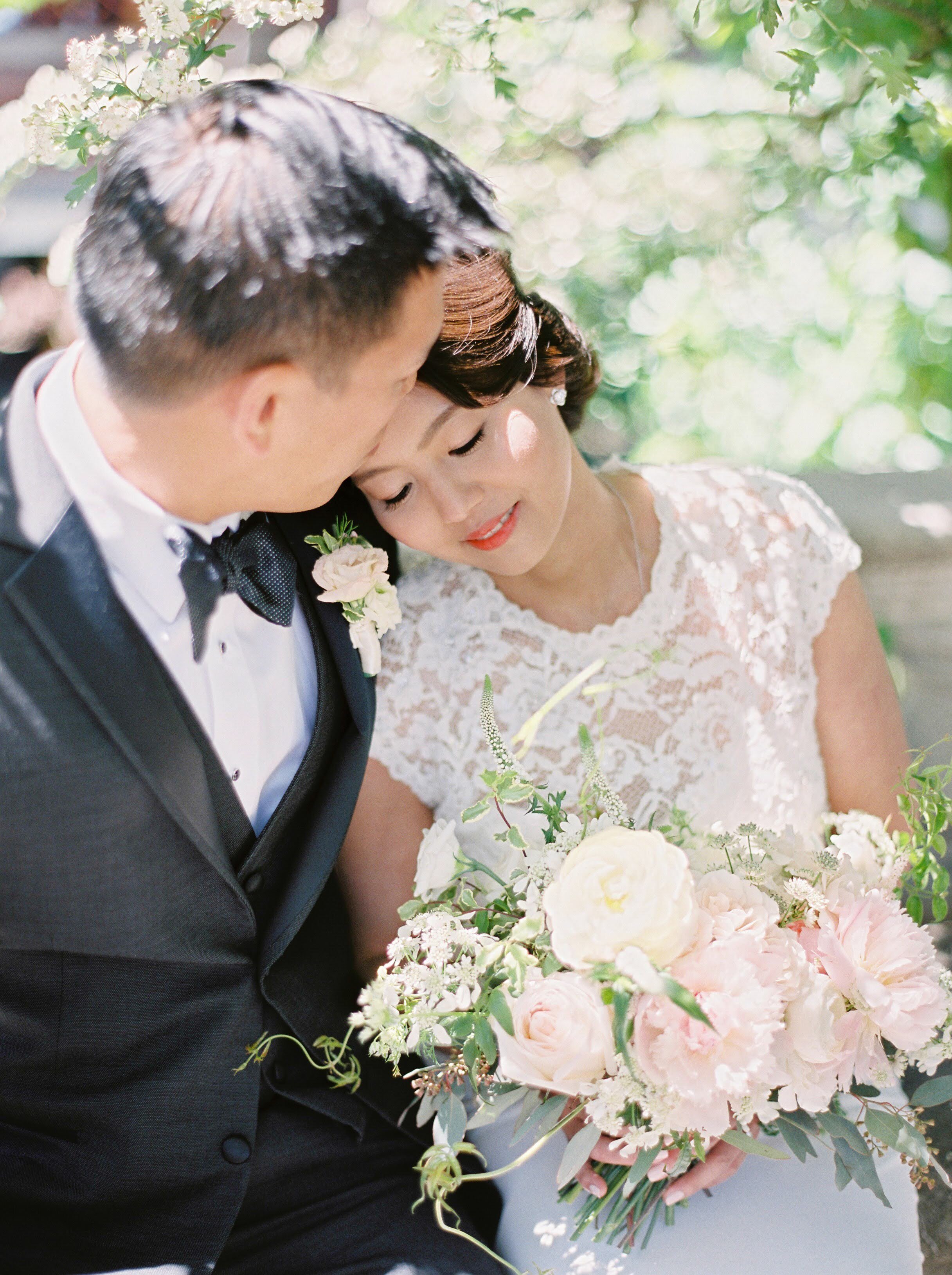 Stephanie & Anthony Rosewood Hotel Georgia Wedding. Intimate wedding couple pictures with blush and white bridal bouquet | Keepsake Events