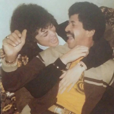As you can see, both of my beautiful parents gave me curls.