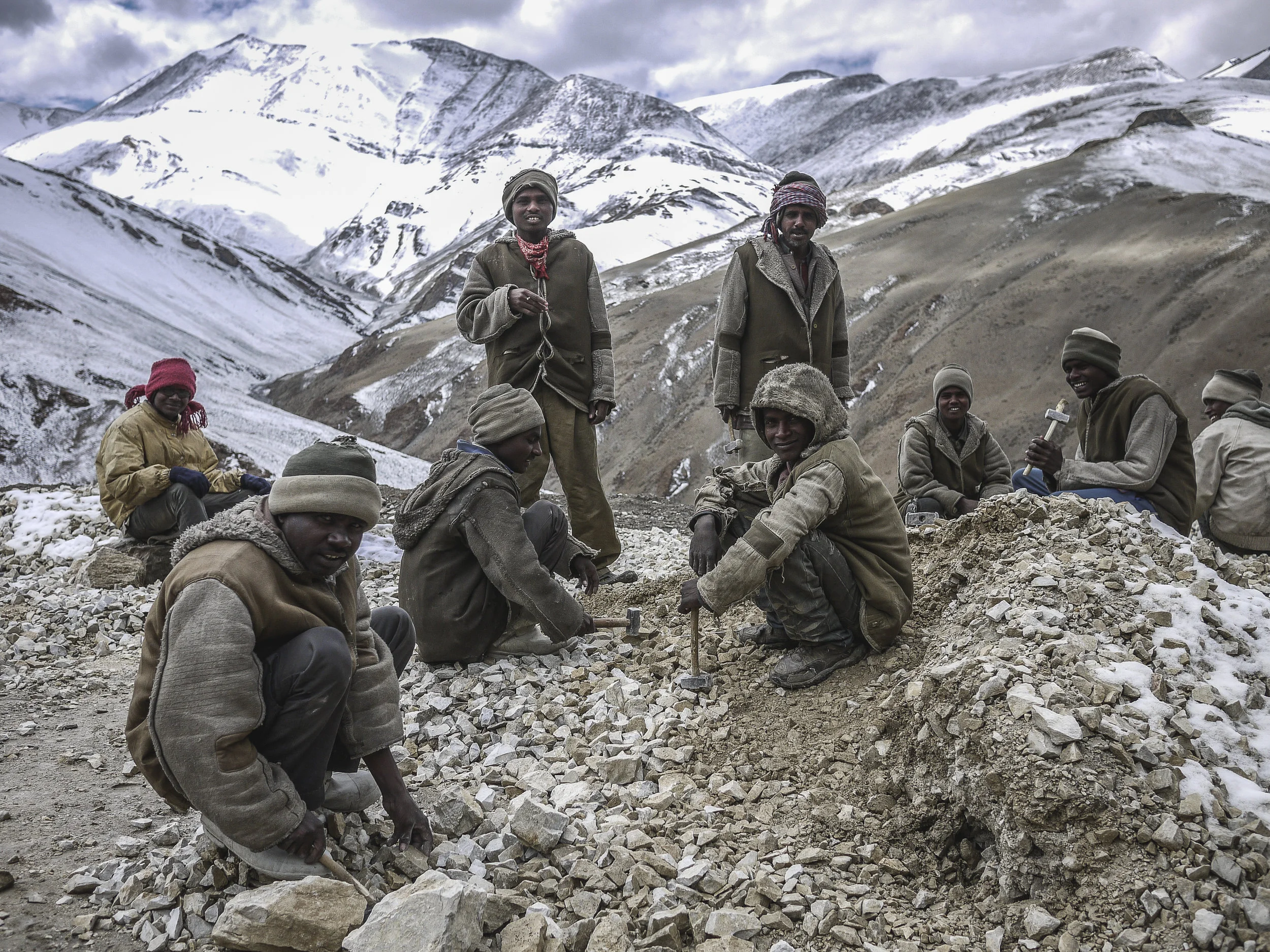Bihari Migrant workers crush rocks on a portion of the highway connecting the regional capital, Leh, with the Changtang Plateau.