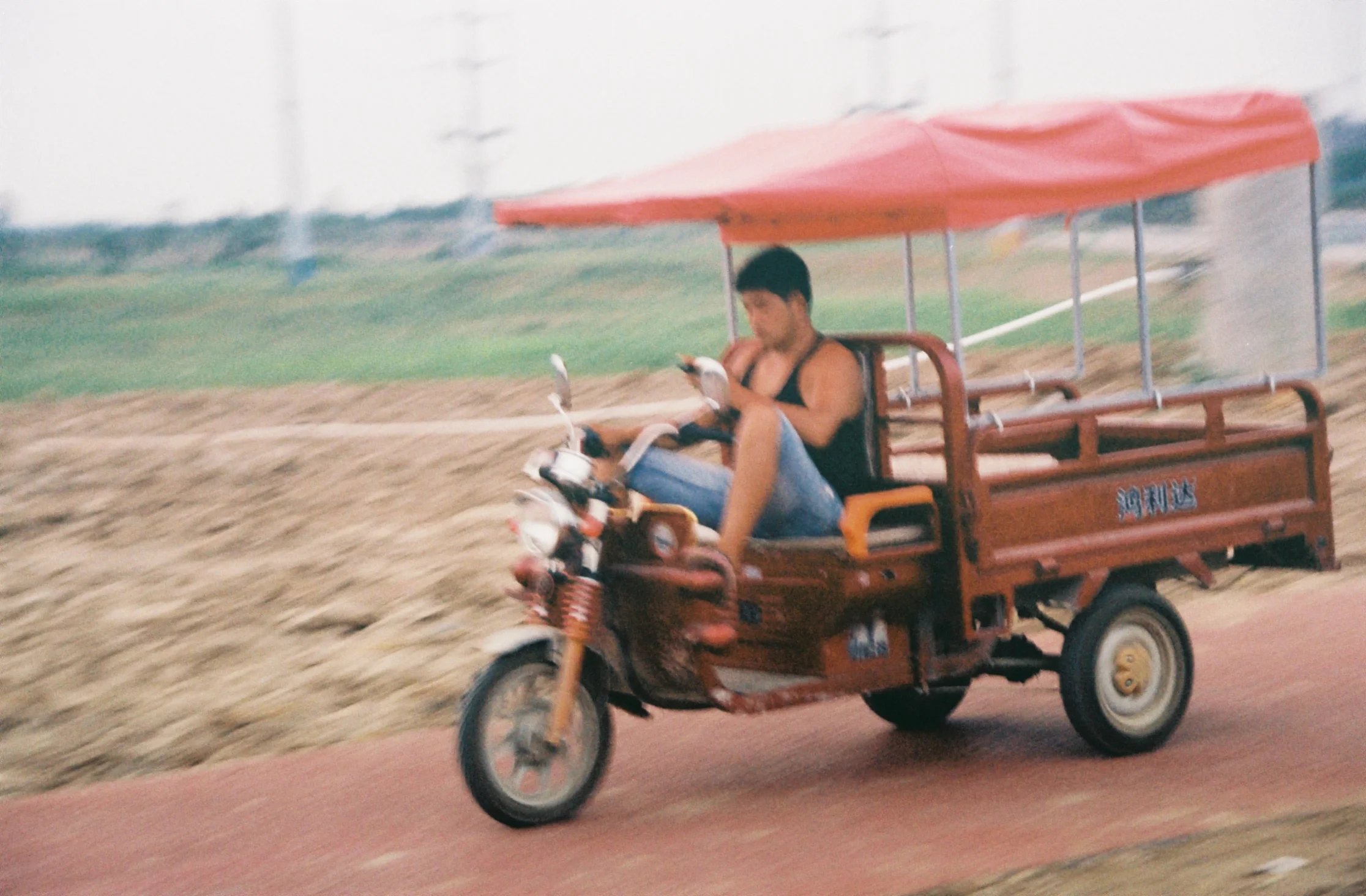 countryside outside of xi'an. man hustling.