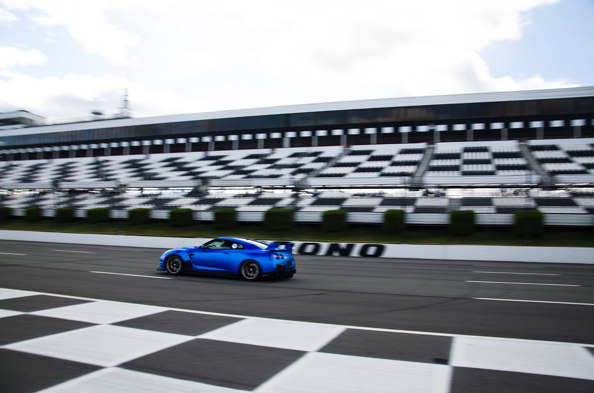 Juan's AMS Performance Alpha 16 R35 GT-R blasting down the front straight at a SlipStream Roll-Racing Event. Photo by Logan Warfield .