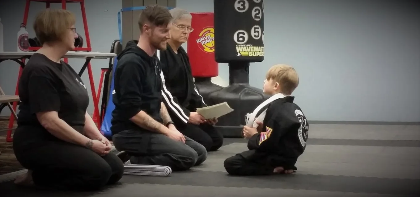 A Happy Sifu Caleb Hood with a Hood's Martial Arts Academy Keiki.