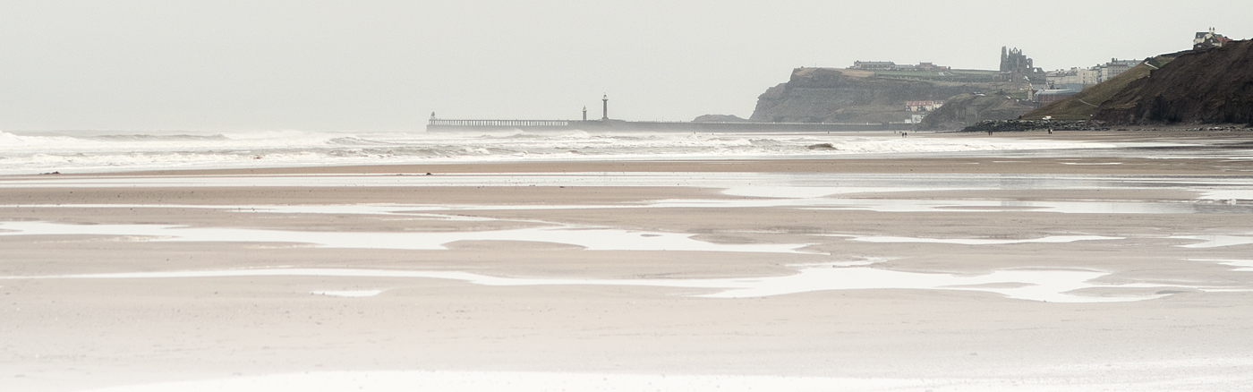 Strings of water on Whitby Beach