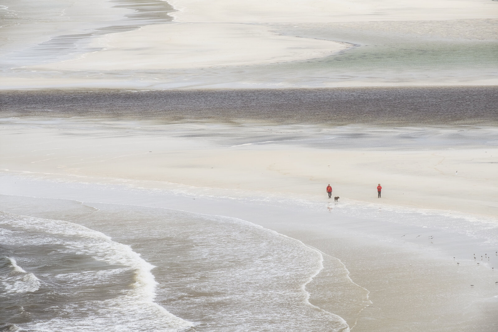 I don’t usually like people in my photographs but I couldn’t resist the contrast made by the red jackets. I posted this image onto Facebook and was contacted by the couple who were walking their dog and recognised themselves. Needless to say I have sent them a copy.