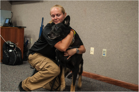 MacDill AFB officer with her K-9 partner