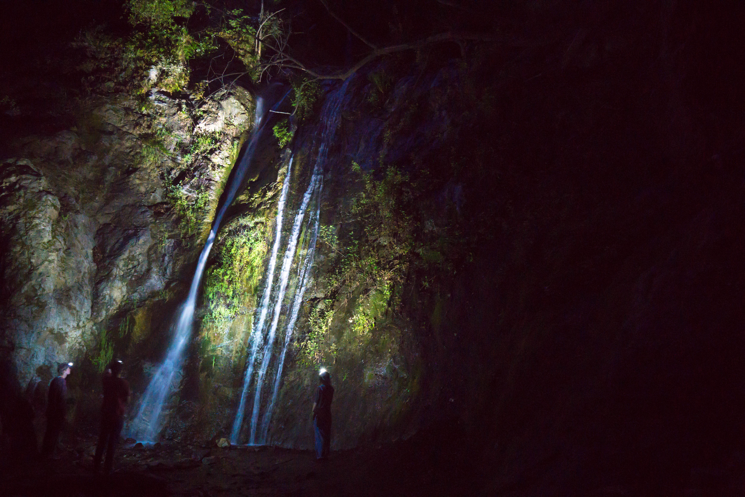 Headlamp hike to the falls. A wild way to experience the landscape.