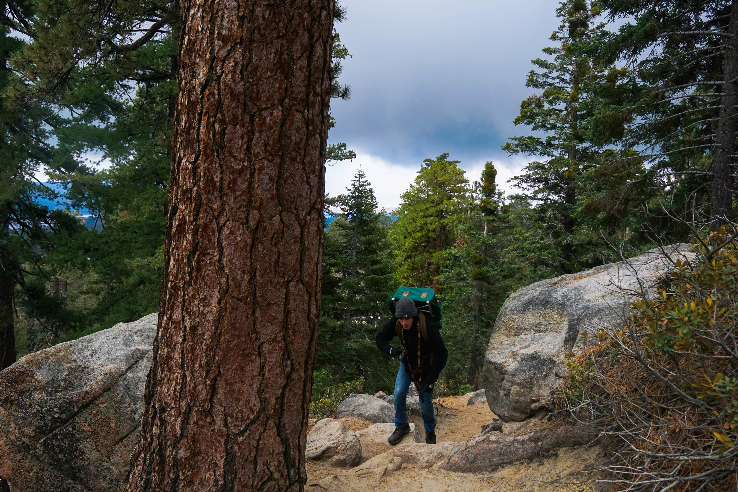 As the storm rolls in over the lake, we begin our trek up to Caste Rock.